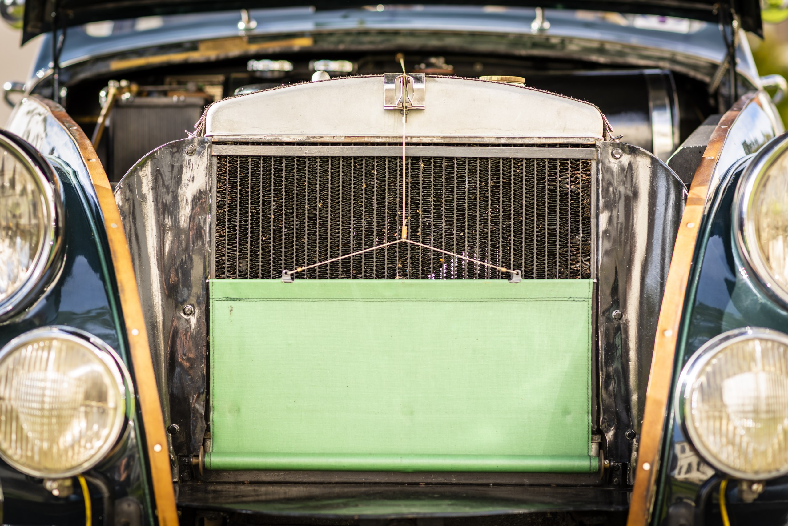 The cord-operated shutter in front of the radiator to help the car ...