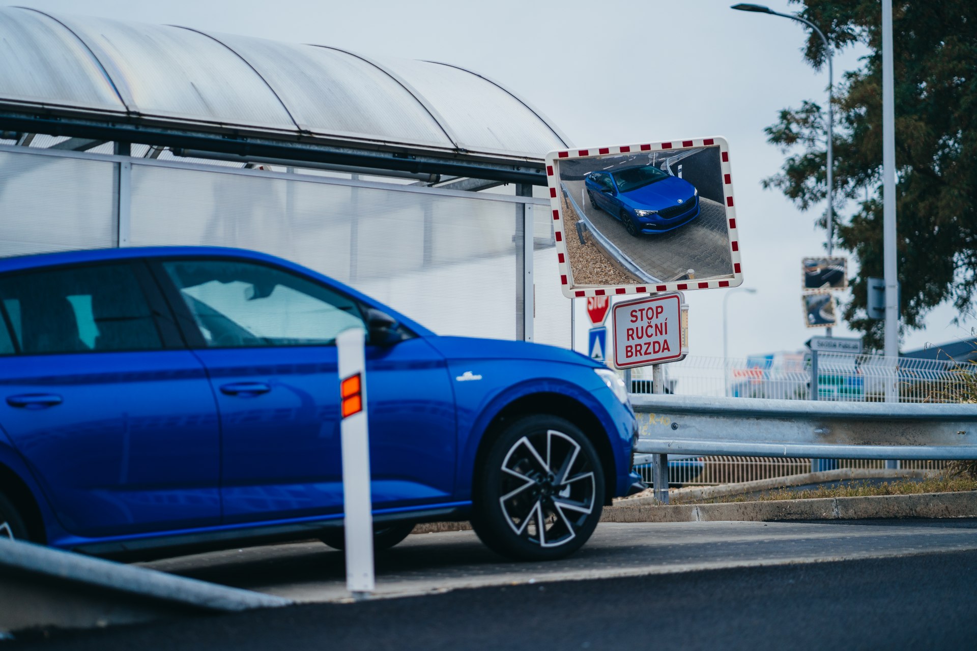 The handbrake is tested on the testing polygon ramp. - Škoda Storyboard