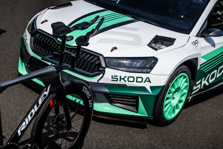 Chasing tenths: on two wheels or four