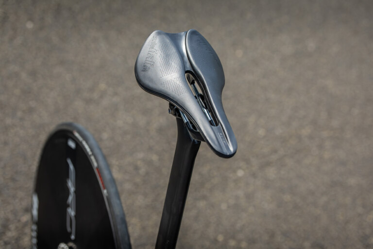 Chasing tenths: on two wheels or four