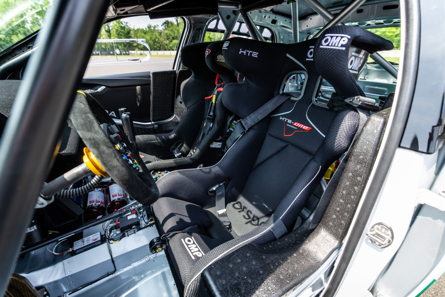 Chasing tenths: on two wheels or four