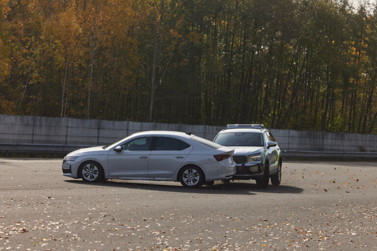 A demonstration of the PIT maneuver, in which a police vehicle stops the pursued vehicle