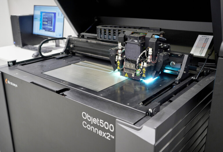 When printing using the Polyjet method, the model is created by curing liquid photopolymer with UV light