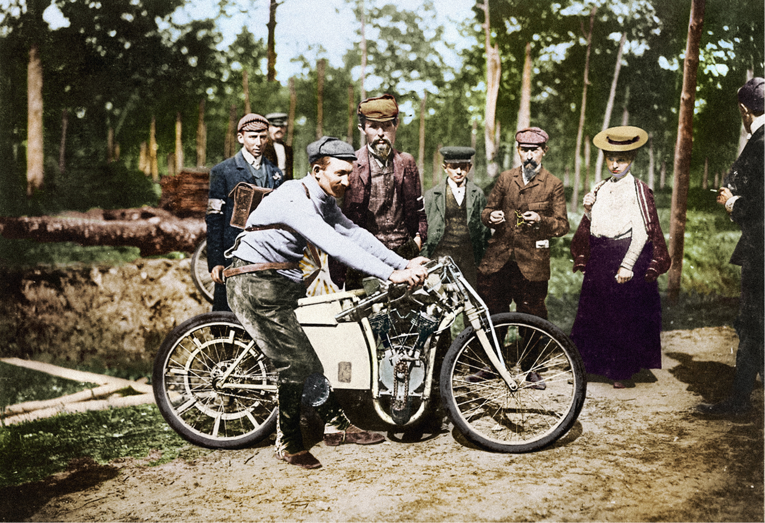 Václav Vondřich was also a motorcycle racer. Here he is pictured at the finish line of the unofficial world motorcycle championship. Václav Klement is standing in the middle