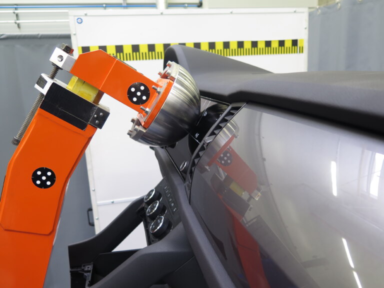 Testing of impact energy absorption by a headform. No injury may occur upon impact.