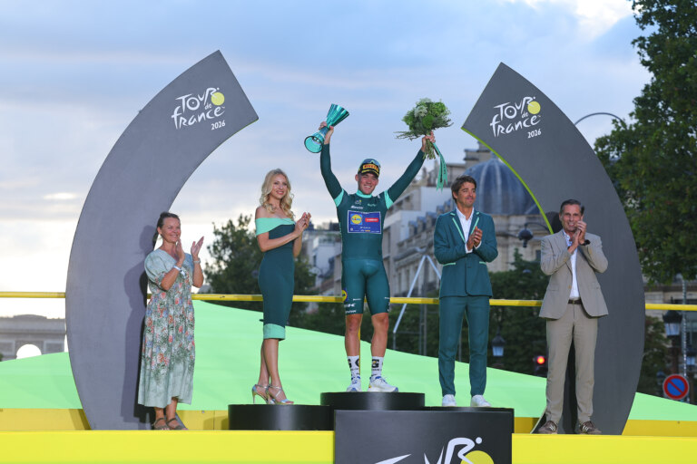 Tadej Pogačar, winner of the 113th Tour de France, receives crystal trophy created by Škoda Design