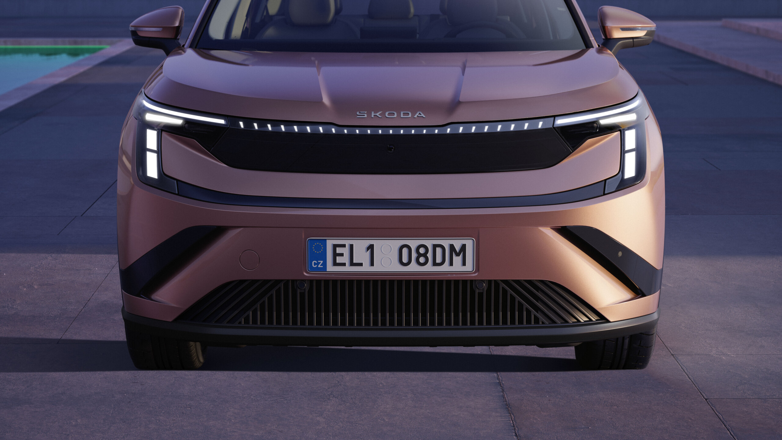 The Tech-Deck face references traditional radiator grilles; the illuminated strip visually widens the car and echoes its ribbing