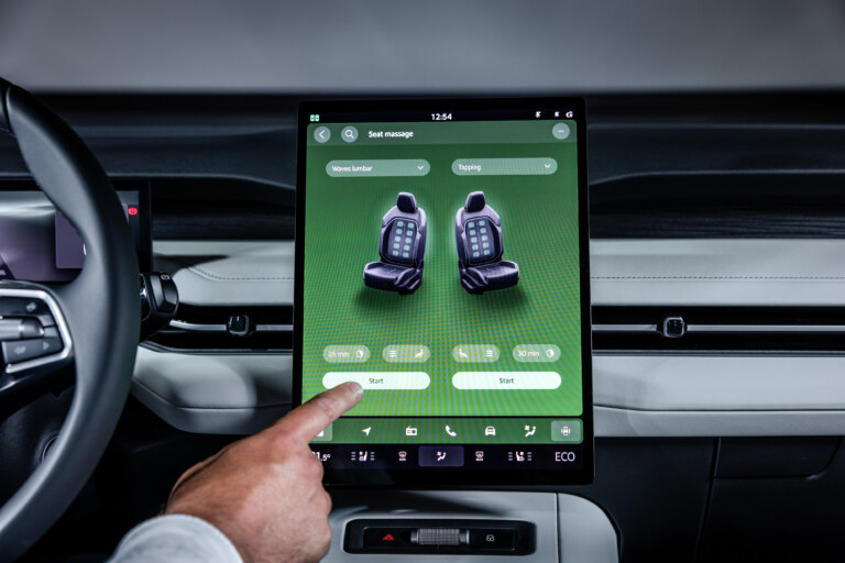 More detailed settings are positioned higher on the display, closer to the driver's natural field of view.